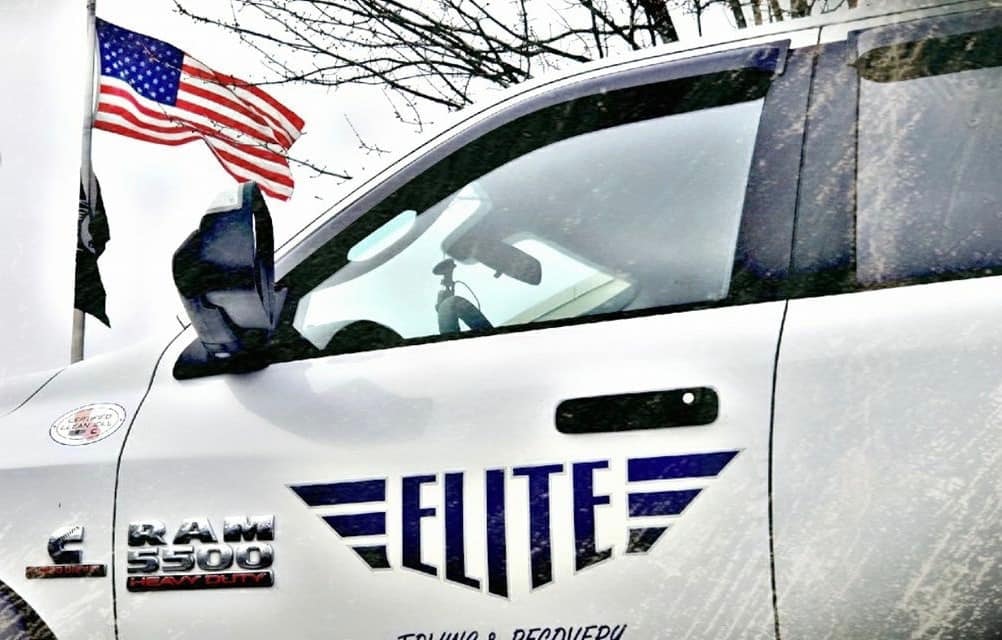 Elite Towing truck with American flag
